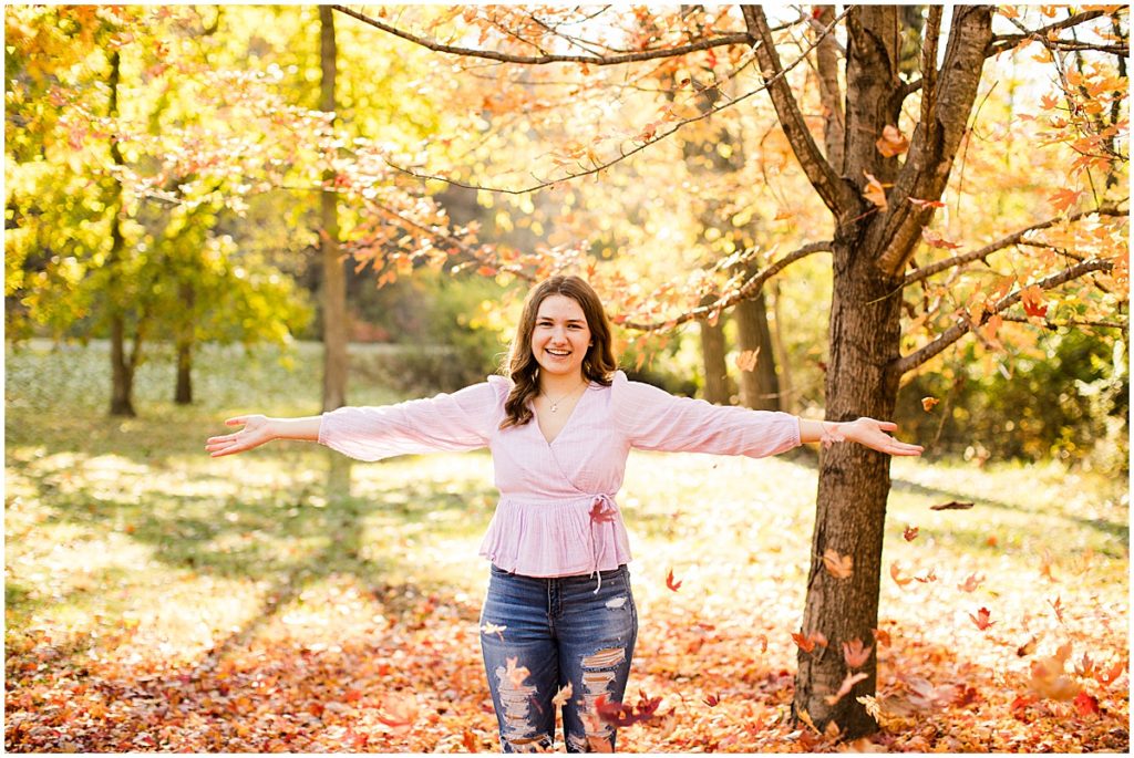 fall senior pictures lions beuth park moberly mo flannel converse railroad car bridge falling leaves